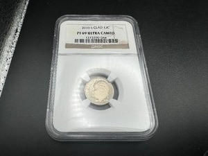 lot 39 image: 2010 S Clad 10C NGC PF69 Ultra Cameo