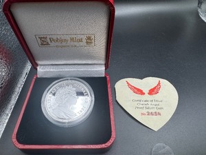 lot 42 image: 2002 1 Oz. Silver Cherub Angel