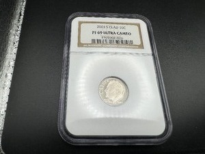 lot 53 image: 2003 S Clad 10C NGC PF69 Ultra Cameo