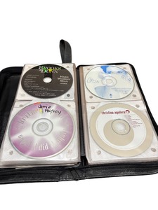 lot 141 image: Binder of Mixed CD Collection