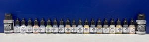 lot 14 image: Lot of 50 Vallejo Model Paints - Model Air, Surface Primer, Varnish & More