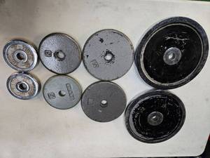 lot 25 image: Lot of 85Lbs One Inch Weight Plates ( see pictures) Two 25lb, Two 10lb , Two 5lb and Two 2.5lB