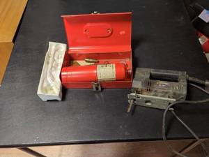 lot 28 image: Used Red Fire Extinguisher with Mounting Bracket