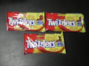 lot 96 image: Set of 3 Twizzlers Filled Twists Sweet & Sour Candy
