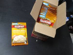 lot 98 image: Box of 12 Idahoan Chicken Broth Mashed Potatoes Pouches (3 lbs)