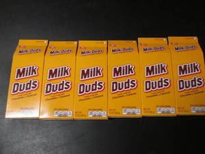 lot 143 image: Lot of 6 Milk Duds Candy Boxes - Chocolate and Caramel
