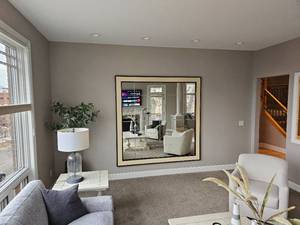 lot 35 image: Custom Cell Divided Wall Mirror with Modern Contemporary Styling Featuring a cream tone Frame with oak Beading