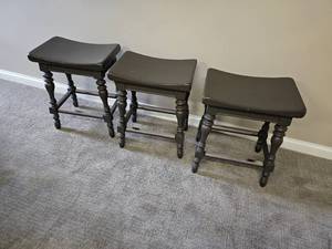 lot 65 image: Grey Saddle Stools Set of Three
