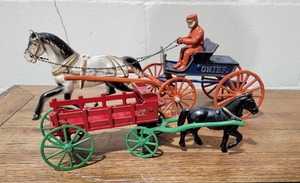 lot 90 image: Vintage Iron Horse Drawn Cart Toys  Lot of 2