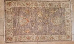 lot 22 image: Muted Wool Area Rug  Taupe  Beige  Tangerine, 45 x 30