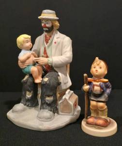lot 156 image: Collectible Figure Pairing