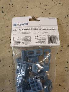 lot 108 image: 4-In-1 Flooring Expansion Spacers