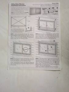 lot 133 image: Tf - New Utility Slider Window with Installation Instructions