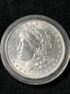 1886 US MORGAN SILVER DOLLAR IN AIRTITE