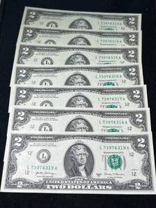 7 CONSEC SERIAL NUMBERED $2 BILLS