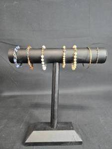 lot 4 image: Collection of 7 Handmade Bracelets with Mixed Beads and Designs - display not included