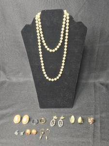 lot 61 image: Vintage Jewelry Collection Including Necklaces, Rings, and Earrings - displays not included