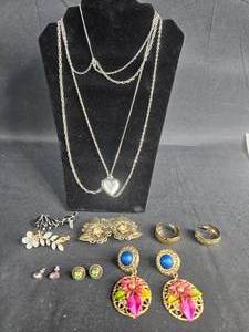 lot 184 image: Collection of Vintage Jewelry including Necklaces, Earrings, and Brooches - display not included
