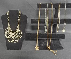 lot 214 image: Lot of 5 Assorted Necklaces including Statement Pieces and Charm Necklaces - displays not included