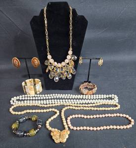 lot 150 image: Collection of Assorted Vintage Jewelry including Necklaces, Bracelets, and Earrings - displays not included