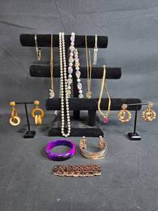 lot 151 image: Assorted Vintage Jewelry Lot including Necklaces, Bracelets, and Earrings - displays not included