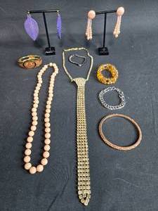 lot 153 image: Mixed Jewelry Lot Including Necklaces, Bracelets, and Earrings - display not included