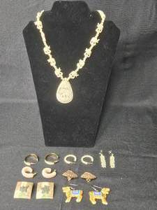 lot 74 image: Vintage Jewelry Collection - Carved Necklace with Multiple Pairs of Earrings - display not included
