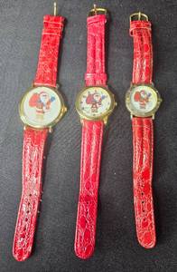 lot 83 image: Lot of 3 Vintage Santa Clause Themed Quartz Watches with Red Bands - untested