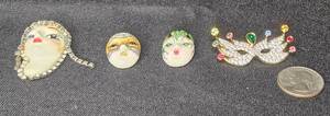 lot 108 image: Collection of 4 Vintage Masked Brooches with Unique Designs