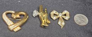 lot 109 image: Set of 3 Vintage Costume Brooches - Heart, Hand, and Bow Designs