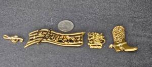 lot 145 image: Lot of 4 Vintage Branson-Themed Brooches - Music Notes, Cowboy Boot, Charley Pride Theatre