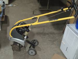 lot 5 image: Used Ryobi Mini-Tiller with Just Add Sand Weight System