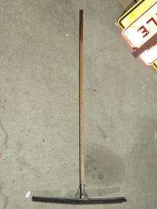 lot 19 image: Used Squeegee with Metal Head and Wooden Handle