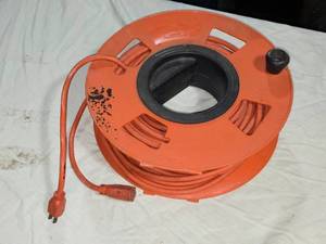 lot 29 image: Extension Cord and Cord Holder - Ground Plug is Cut