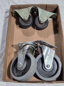 lot 52 image: 4 Caster Wheels with Mounting Brackets