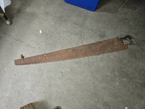 lot 74 image: Antique Hand Saw with Wooden Handle, Just Under 5 Feet Long