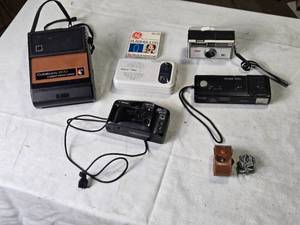 lot 91 image: Collection of Vintage Instant and Film Cameras with Accessories
