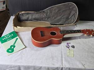 lot 97 image: Vintage Seville Ukulele with Case and Instruction Manual