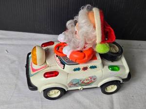 lot 106 image: Vintage Santa Claus Toy Car - 1984