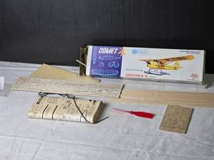 lot 108 image: Vintage Comet Aeronca K Rubber-Powered Model Airplane Construction Kit - Appears Complete