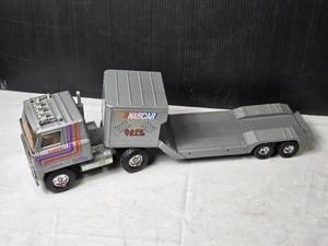 lot 126 image: Vintage NASCAR Race Team Truck and Trailer by Ertl - Made in USA