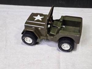 lot 145 image: Tonka Military Green Toy Jeep with White Star Design