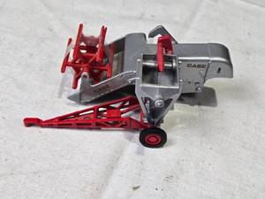 lot 157 image: ERTL Case Model Pull Type Combine Harvester Toy 143 Scale