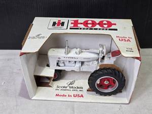 lot 165 image: 116 Scale Farmall M Model Tractor - Limited Edition Centennial 1902-2002 by Joseph L. Ertl, Inc.