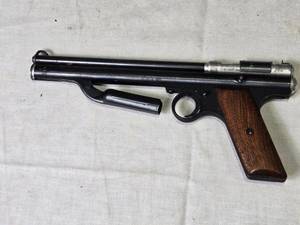 lot 200 image: Crosman 130 Air Pistol with Wood Grip