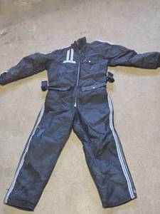 lot 205 image: Vintage Sno Jet Polarwear Ski Suit with Blue and White Stripes, Size Unknown