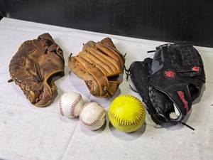 lot 218 image: Set of 2  Baseball Gloves One Right Hand, One Left Hand and 3 Balls (2 Baseballs and 1 Softball)
