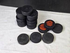 lot 219 image: Lot of Hockey Pucks