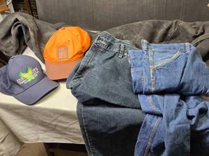 lot 261 image: Lot of 2 Hats and 2 Pairs of Jeans - Big Ben and Wrangler Sizes 36x32 & 44x32