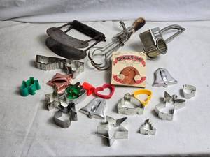 lot 343 image: Vintage Cookie Cutter Collection with Mouli Grater and Cookie Stamp